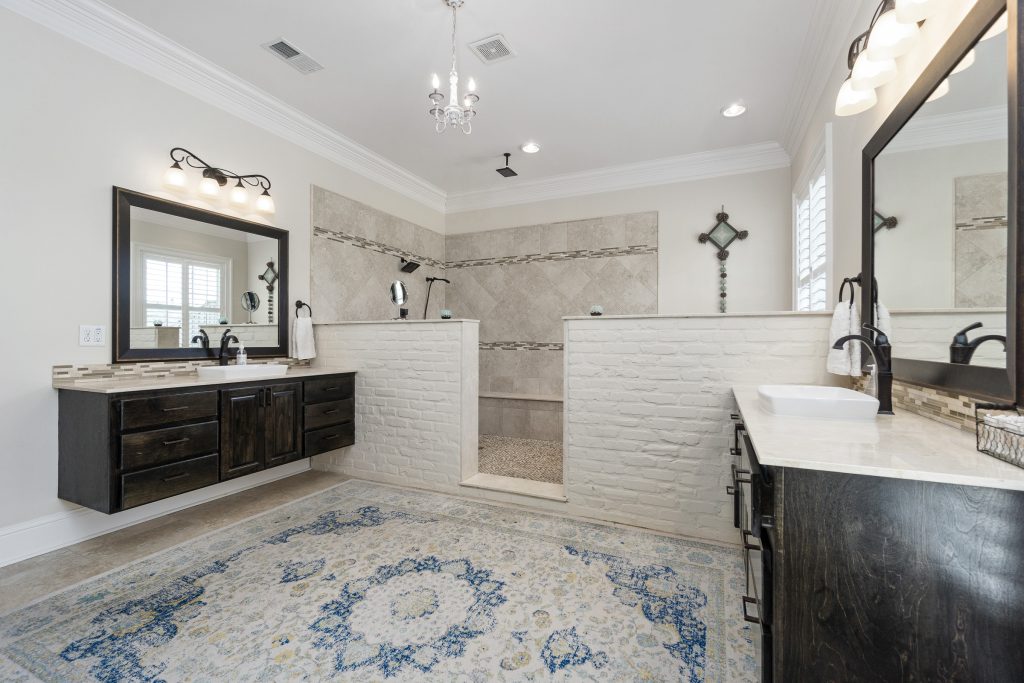 Luxury bathroom with large walk-in shower and freestanding tub inside the shower area