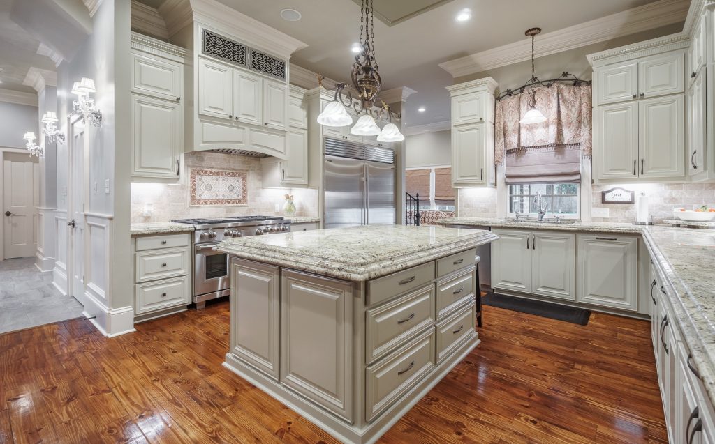 Gourmet kitchen with large island and quartz countertops
