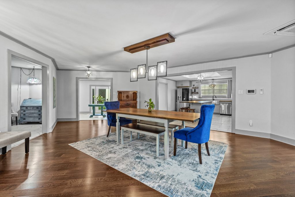 Dining table centered in an octagon-shaped open living area